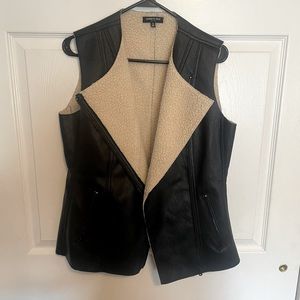 Leather and faux lamb fur vest